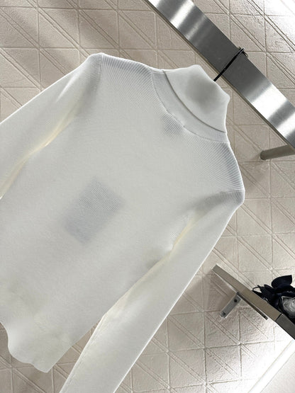 25 Bow tie high neck long sleeved sweater