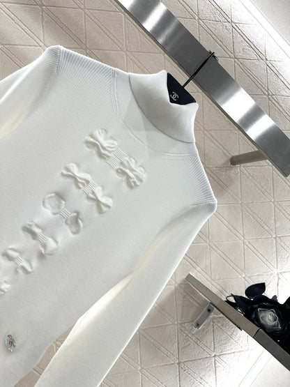 25 Bow tie high neck long sleeved sweater