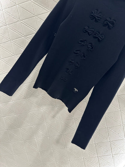 25 Bow tie high neck long sleeved sweater