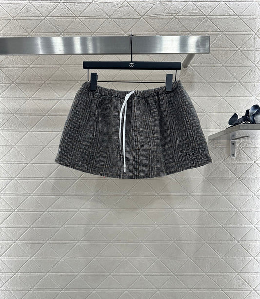 25 Plaid drawstring imitation wool mini skirt