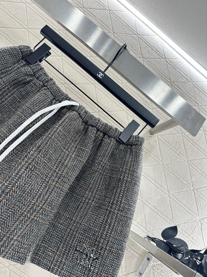 25 Plaid drawstring imitation wool mini skirt