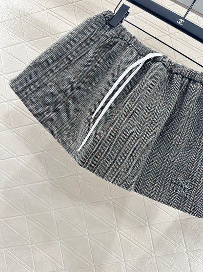 25 Plaid drawstring imitation wool mini skirt