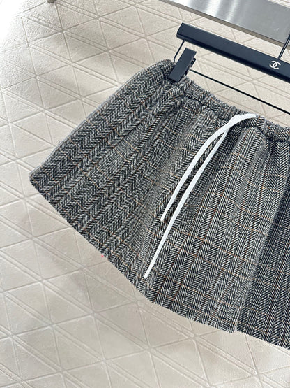 25 Plaid drawstring imitation wool mini skirt