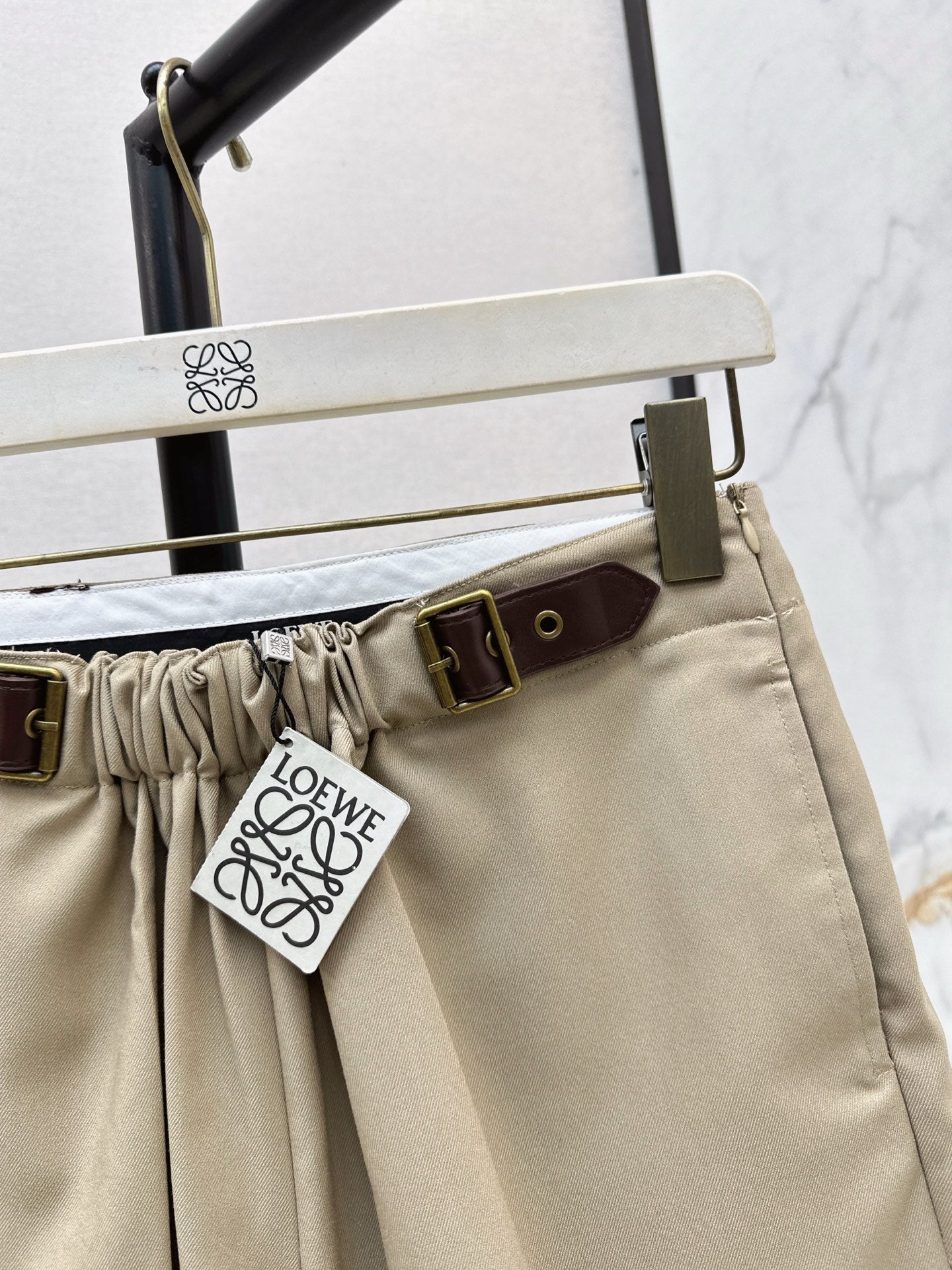 25 Leather buckle elastic high waisted pants