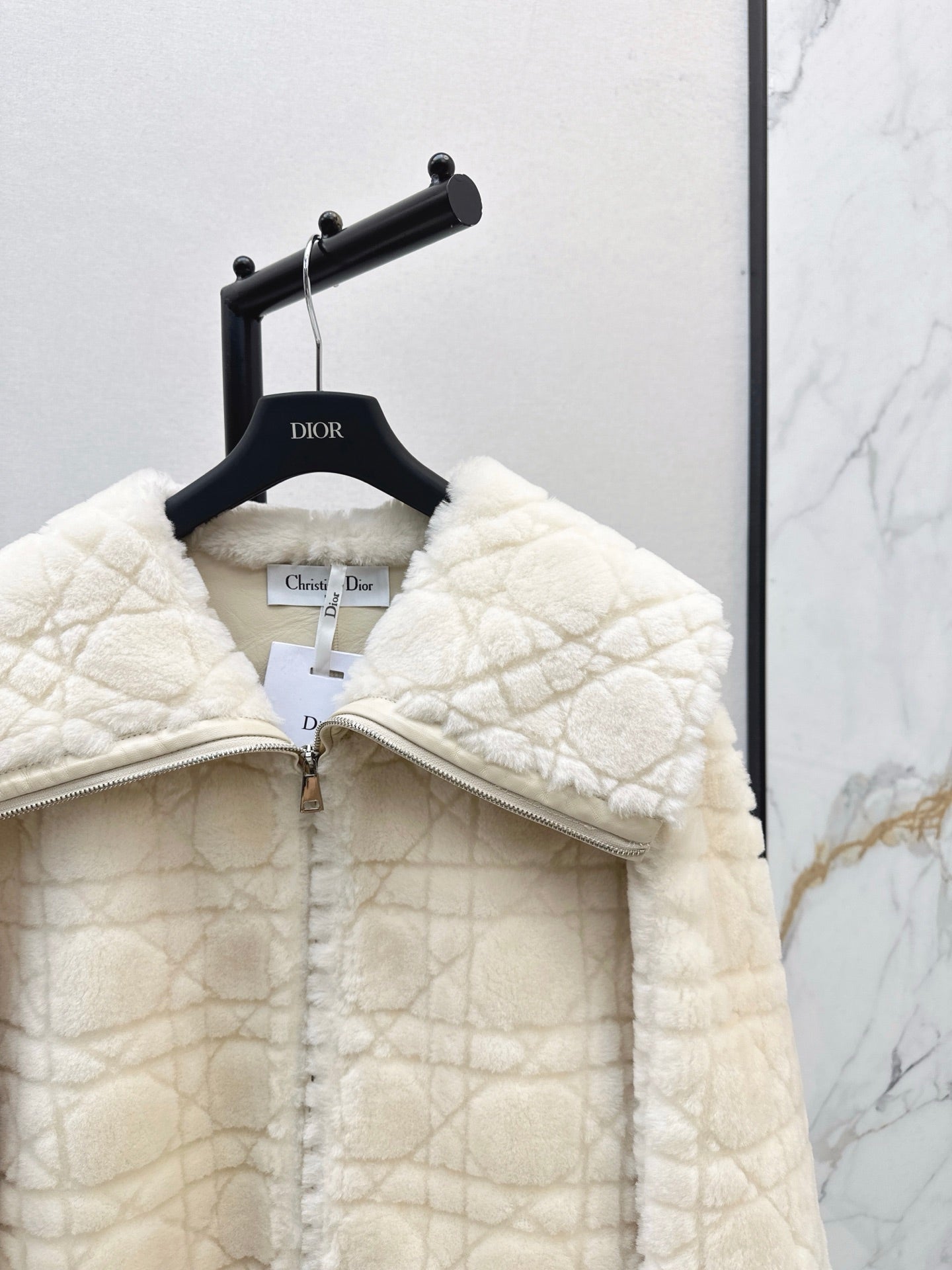 Check fur coat with large lapels