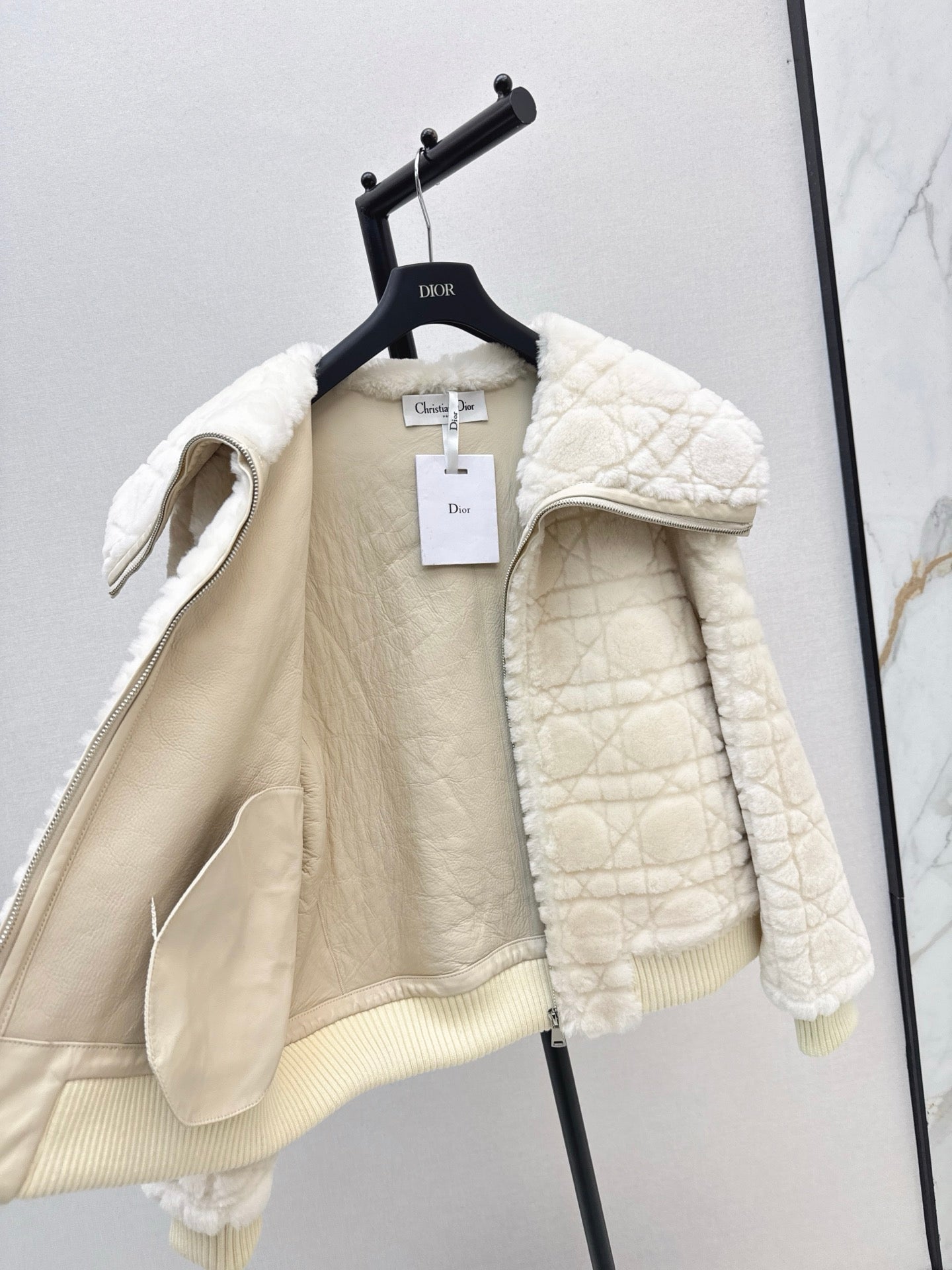 Check fur coat with large lapels