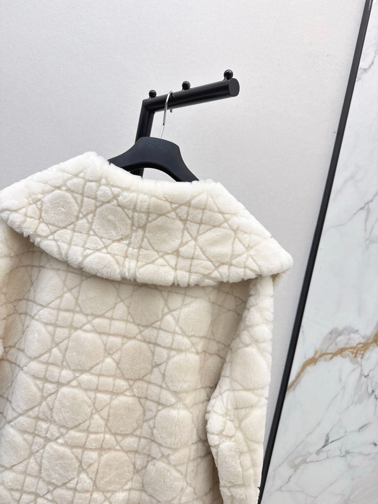 Check fur coat with large lapels