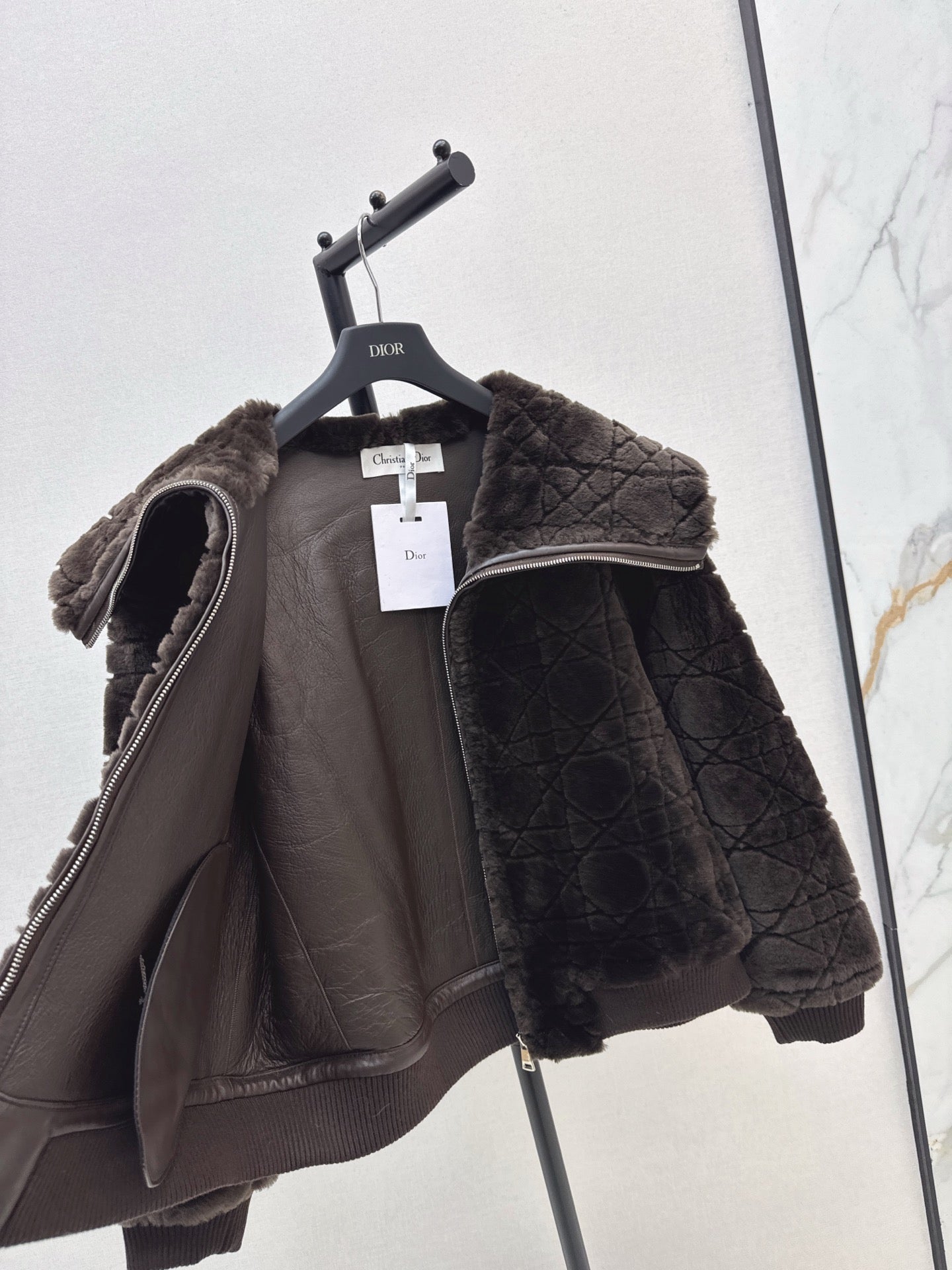 Check fur coat with large lapels