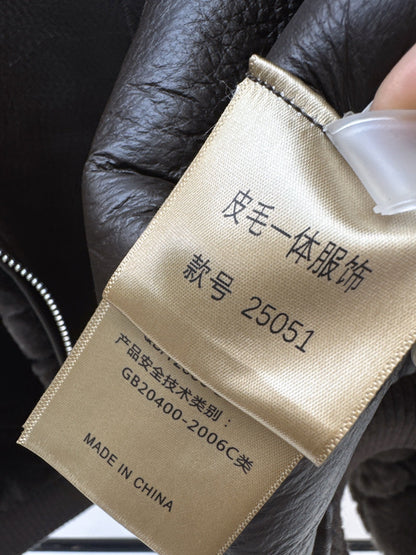 Check fur coat with large lapels