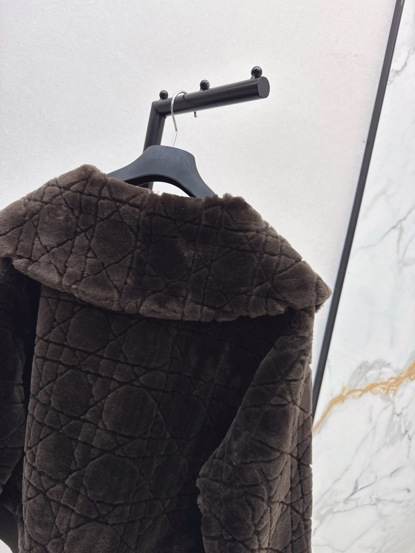 Check fur coat with large lapels