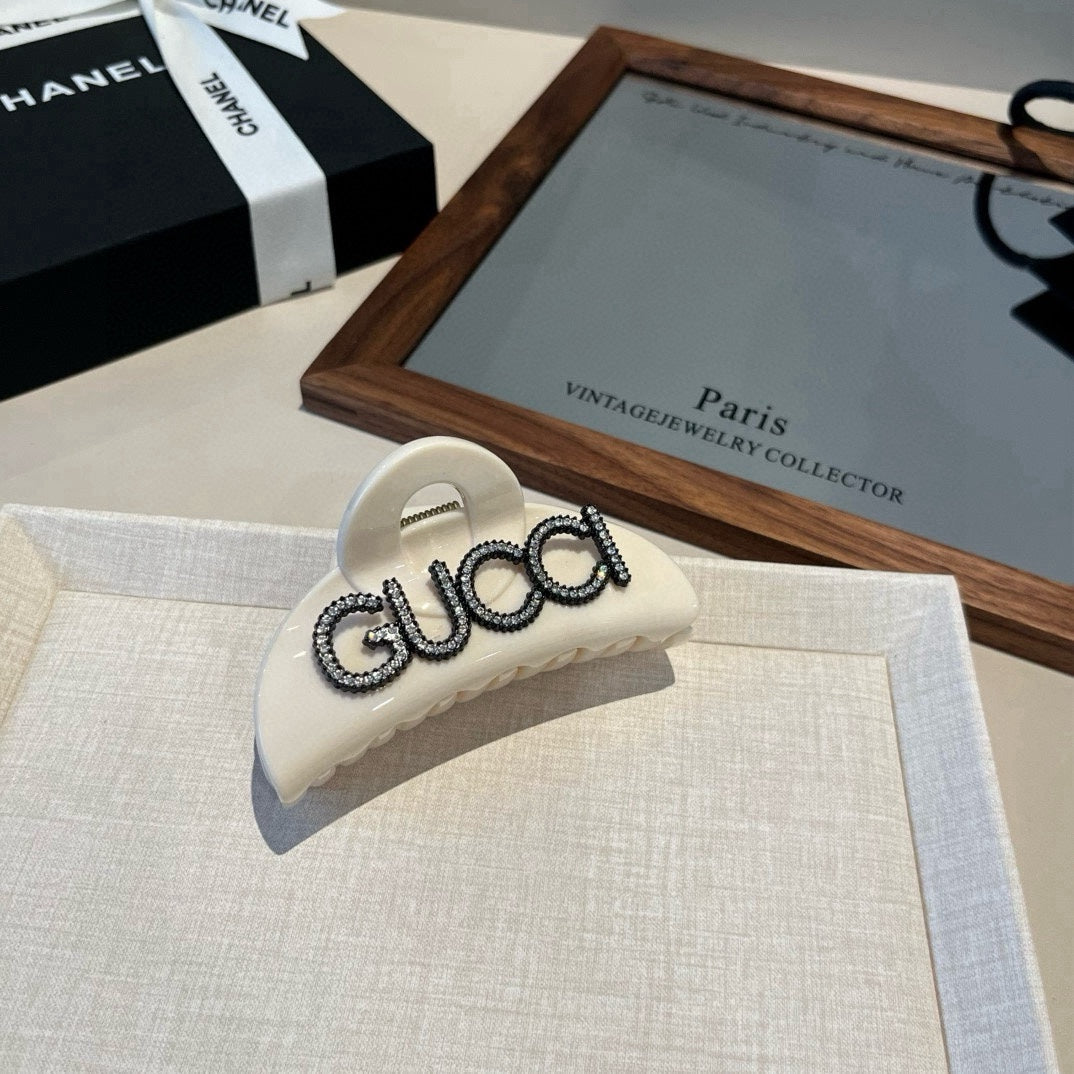 Diamond logo hair clip