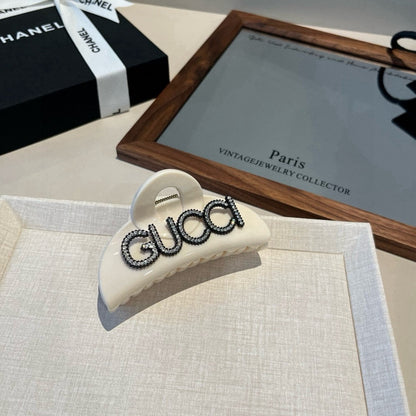 Diamond logo hair clip