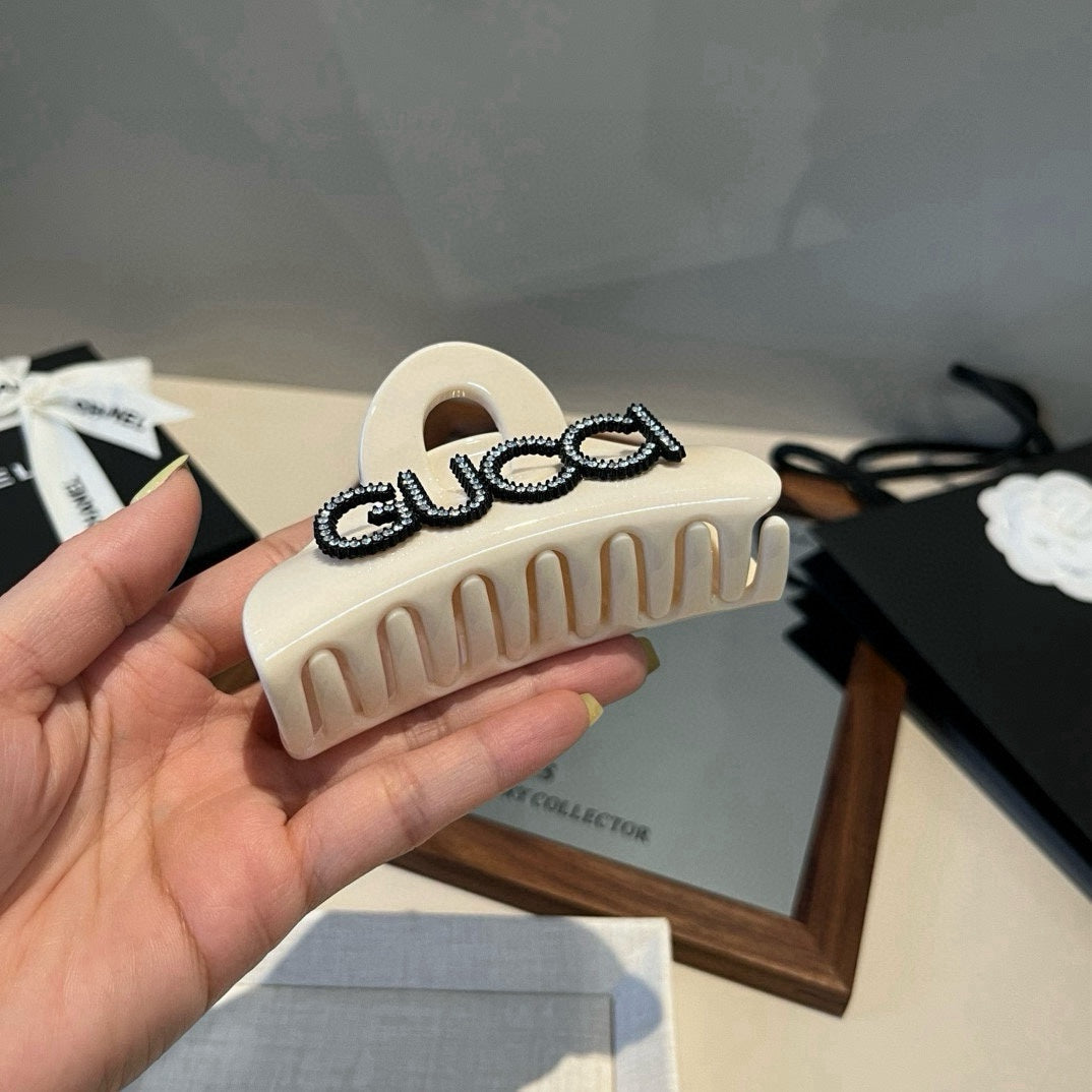 Diamond logo hair clip