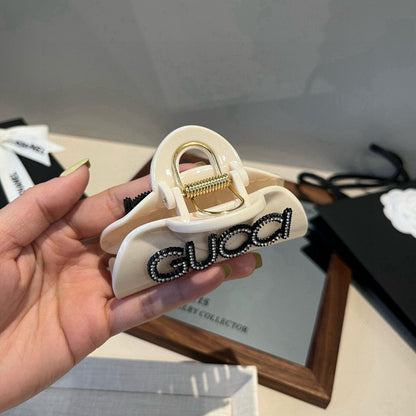 Diamond logo hair clip