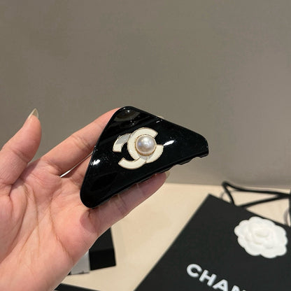 Pearl logo hair clip