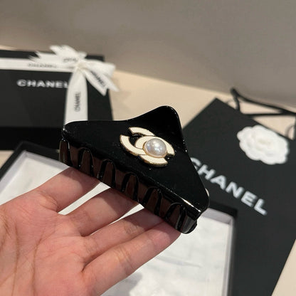 Pearl logo hair clip