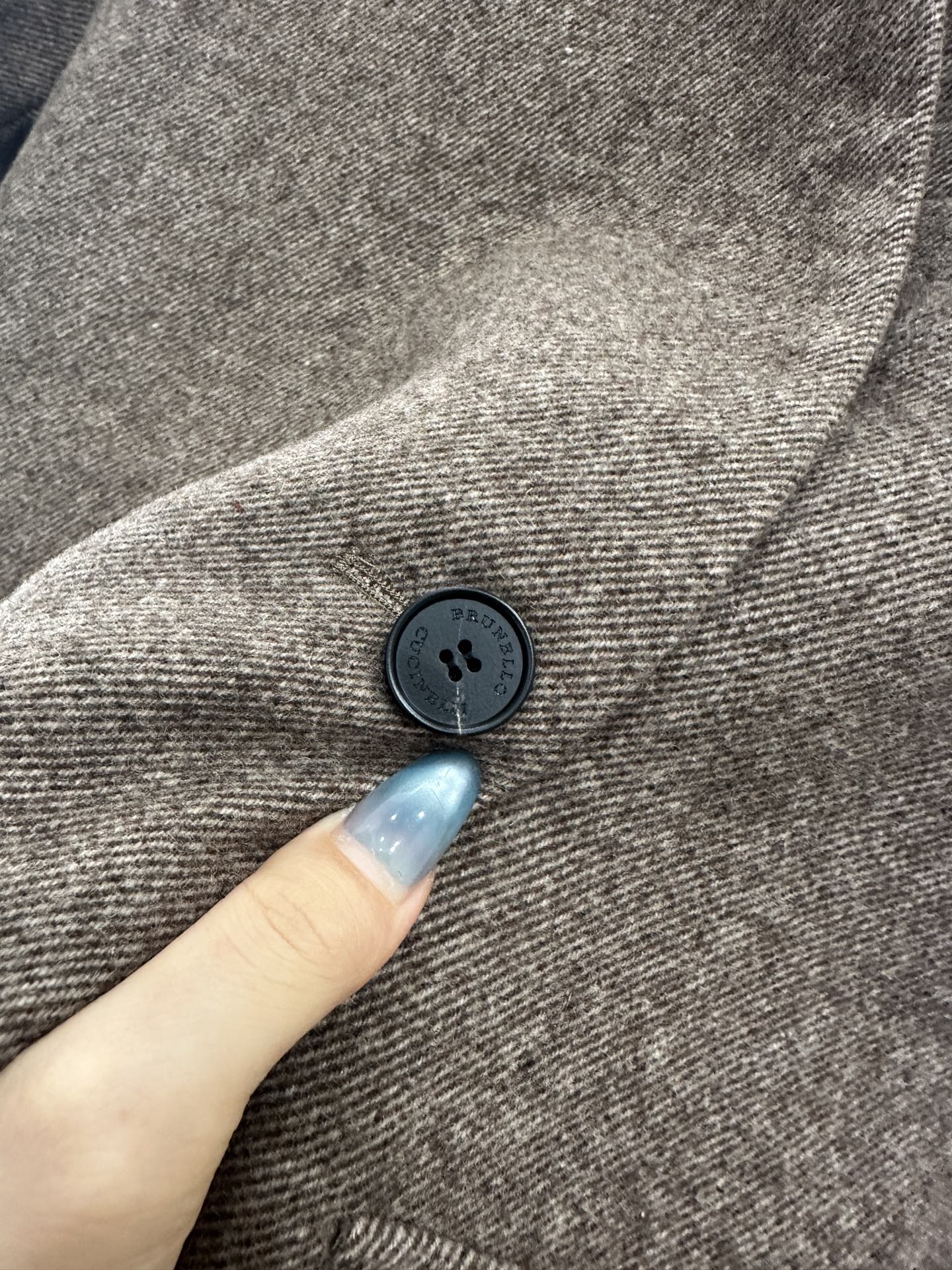 Belted long wool coat