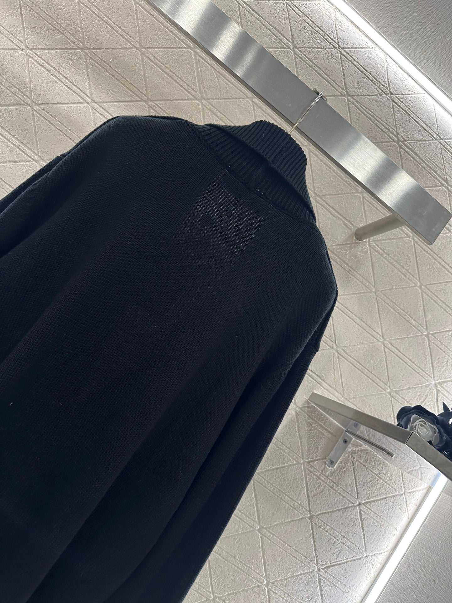 Knitted wool jacket with collar and open collar