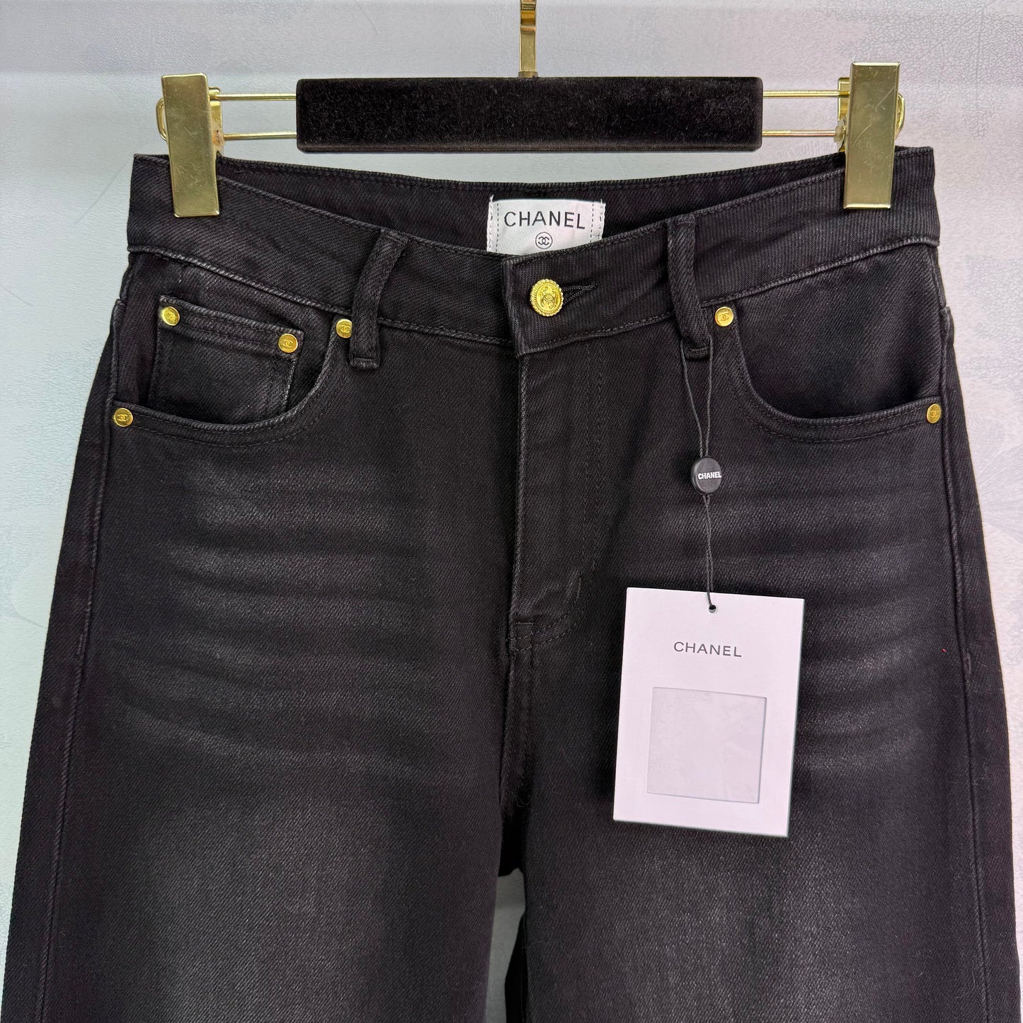 New style straight leg jeans with gold buttons