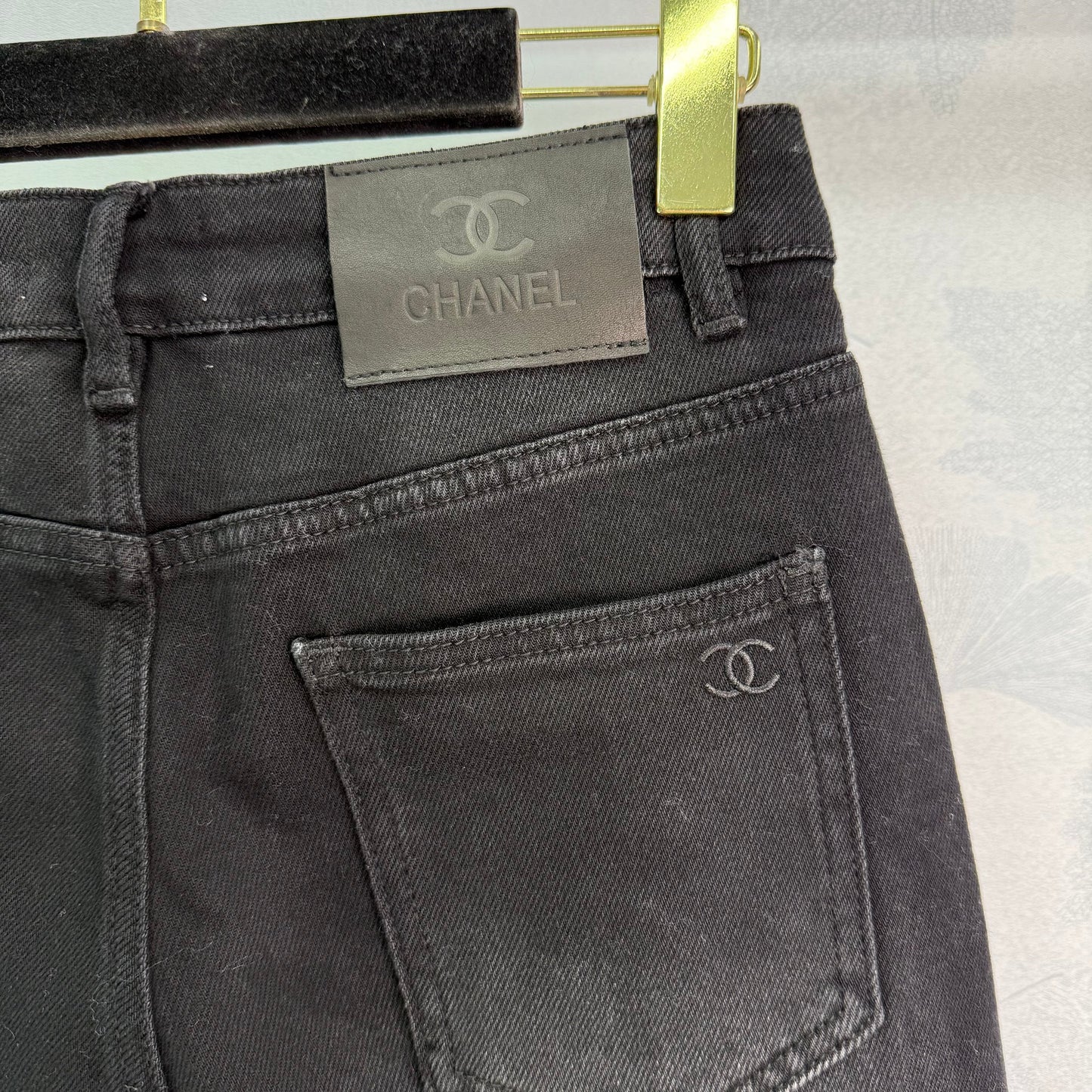 New style straight leg jeans with gold buttons