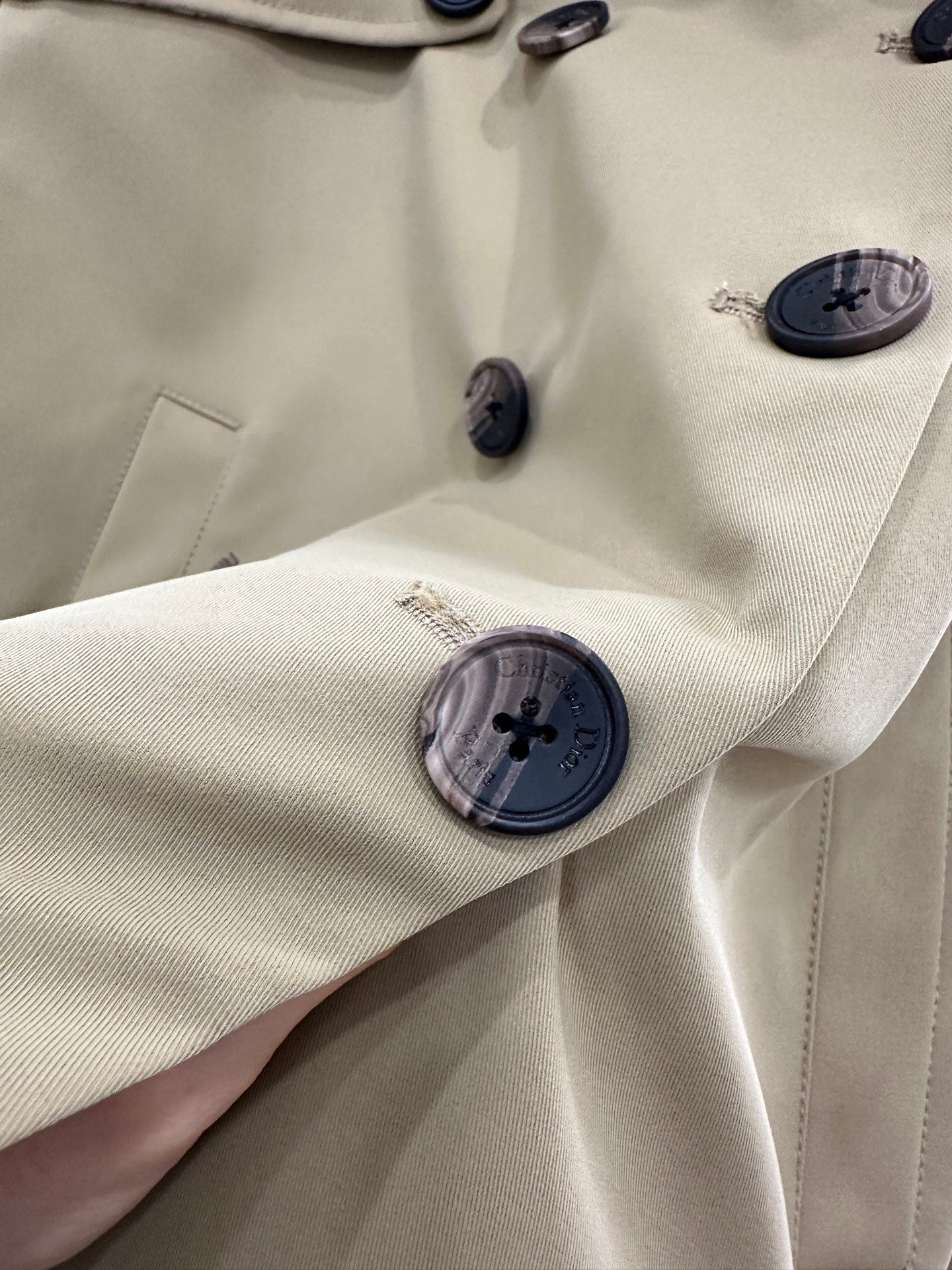 Belted mid-length trench coat