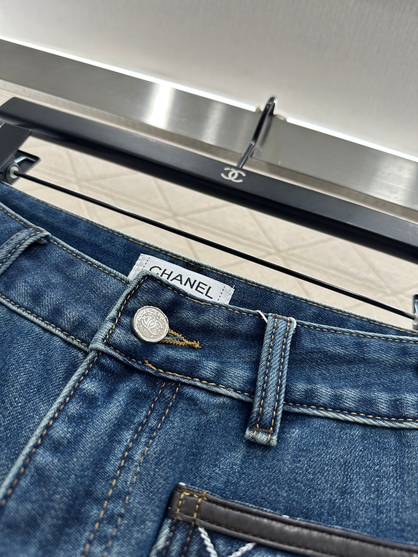 Diamond-patterned logo pocket jeans