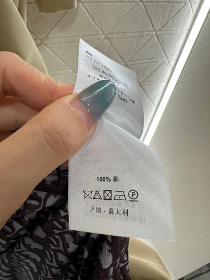 Pleated belted long trench coat